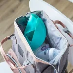 Мек силиконов лигавник Roll n Go Tommee Tippee, навива се на компактно руло за лесно прибиране, тюркоазен цвят, 6м+ 0146.004