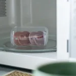 Комплект от 2 бр. ортодонтични залъгалки Tommee Tippee ANY TIME със симетричен силиконов биберон, 6-18м, розови с декор KIND, в кутия за стерилизиране TT.0273 